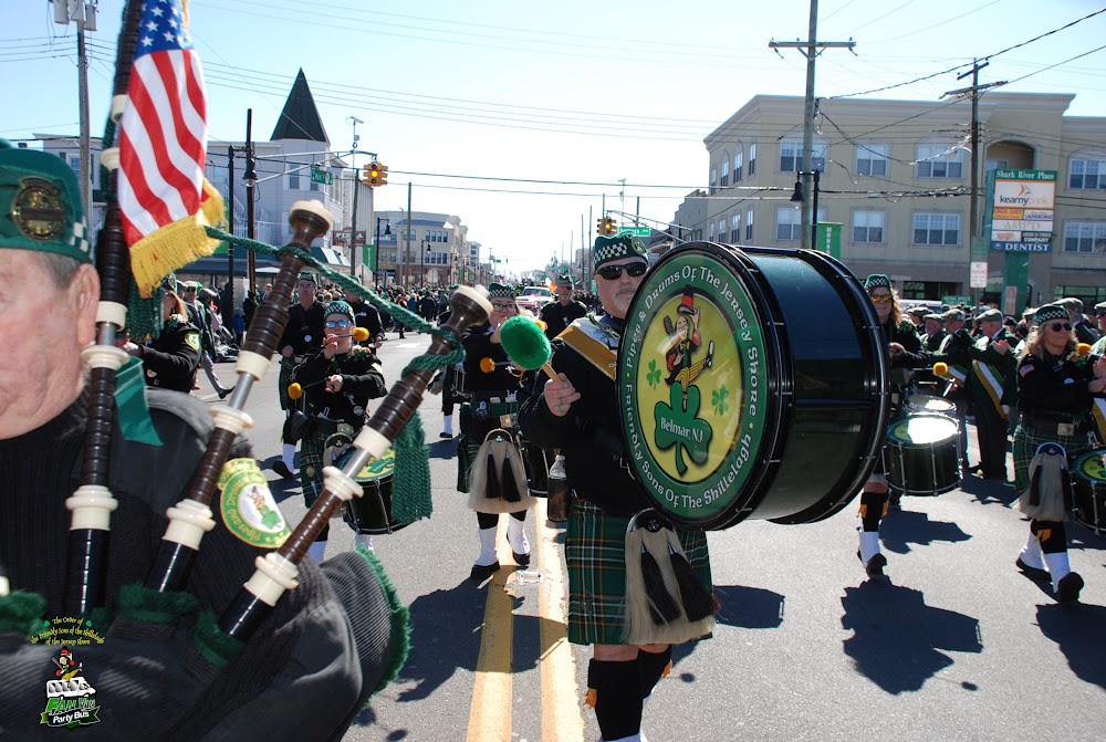 The band's bass drummer marching with the Jersey Shore Shillelagh drum
